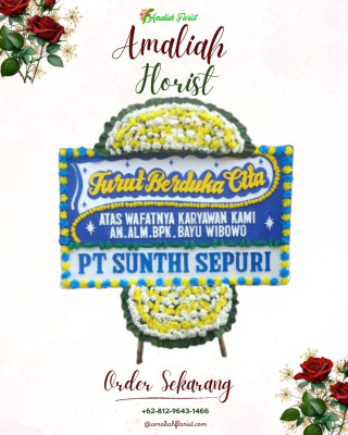 Papan Bunga Duka di Batu Meja